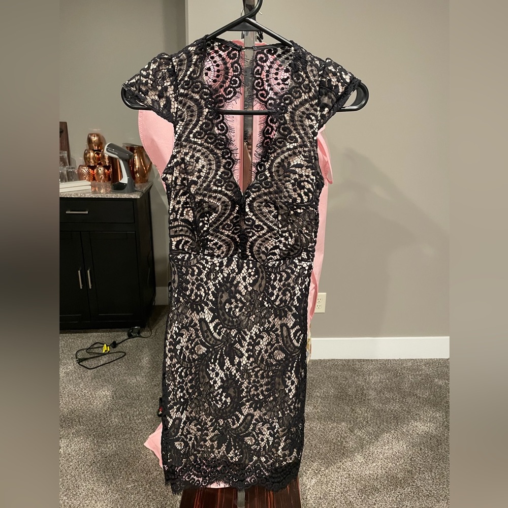 Black lace over nude dress